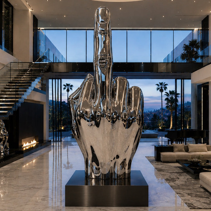 Modern interior with a large metallic sculpture of a hand in a high-five gesture.