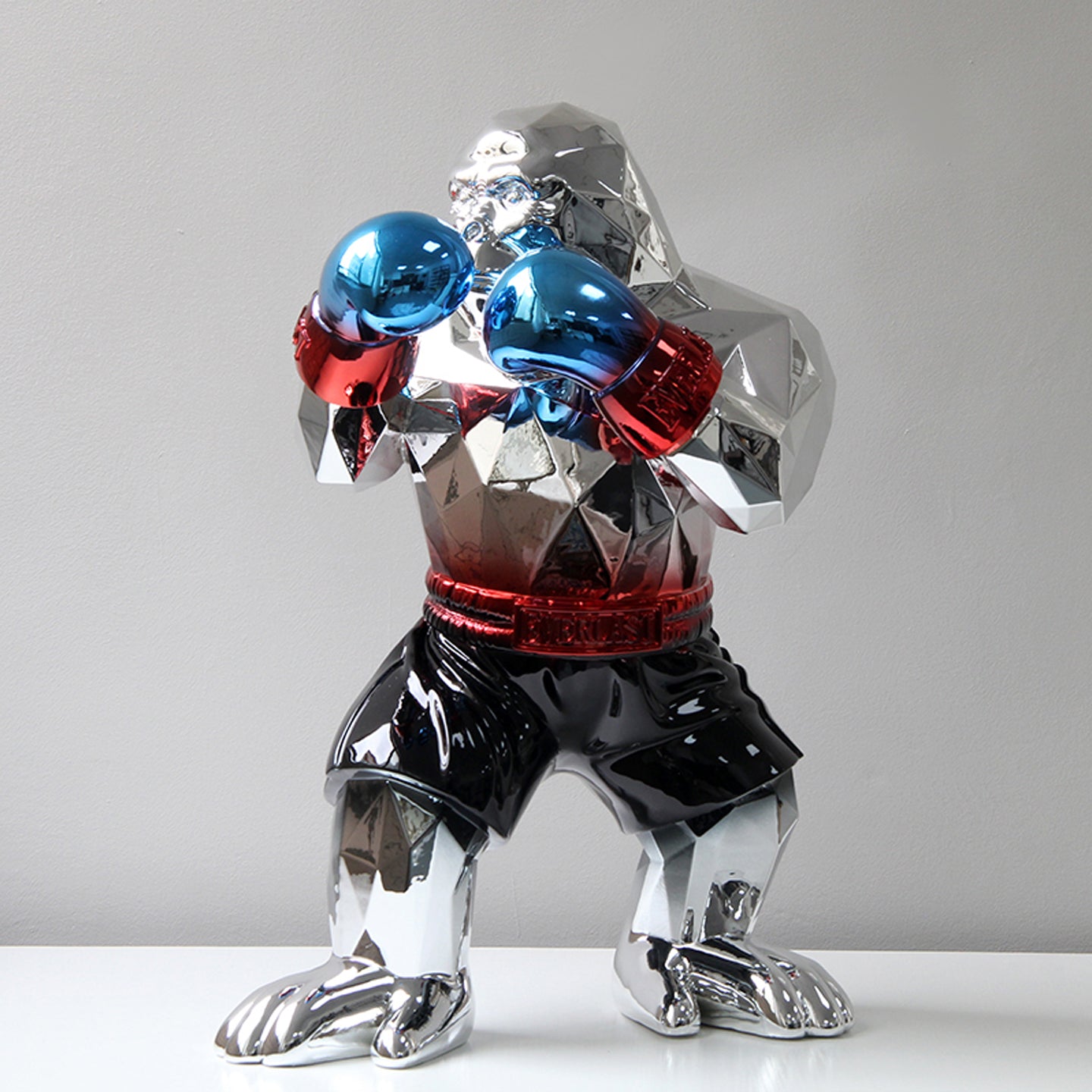 ArtZ® Urban Primate Boxing Gorilla Sculpture Boxing Gorilla Sculpture Silver Gorilla; Black Shorts; Blue Gloves