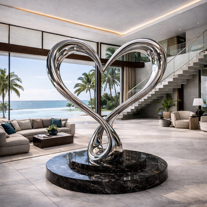 Modern interior with a large metallic heart sculpture in a living room.