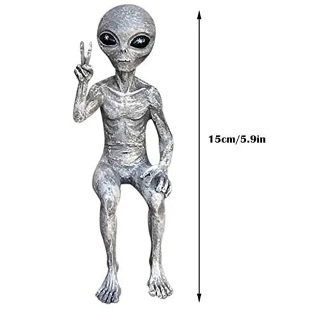 Premium Photo | A close up of a statue of an alien Premium Photo | A close up of a statue of an alien
