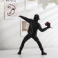 ArtZ® Man Throwing Flowers Sculpture - Splentify